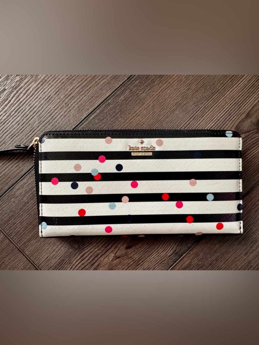 kate spade Black Zip-Around Leather Wallet with Gold Hardware